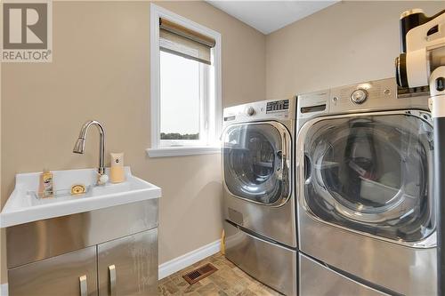 18 Ruttan Road, Renfrew, ON - Indoor Photo Showing Laundry Room