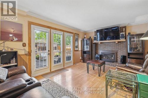 12 The Cedars Street, St. Catharines, ON - Indoor Photo Showing Living Room With Fireplace