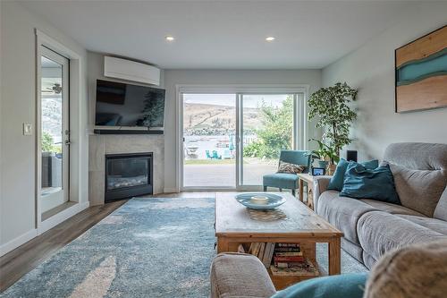 7953 Okanagan Landing Road, Vernon, BC - Indoor Photo Showing Living Room With Fireplace