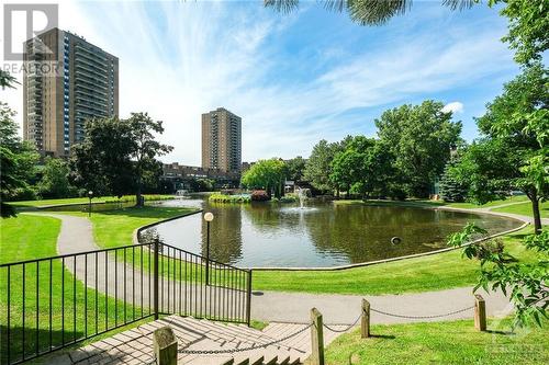 Entry into the parklands. An oasis you will not find anywhere else in the city! - 260 Brittany Drive Unit#103, Ottawa, ON - Outdoor With Body Of Water