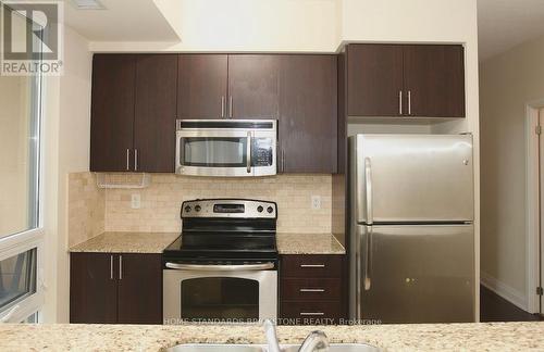 704 - 520 Steeles Avenue W, Vaughan, ON - Indoor Photo Showing Kitchen With Upgraded Kitchen