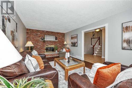 1032 William Mooney Road, Carp, ON - Indoor Photo Showing Living Room With Fireplace