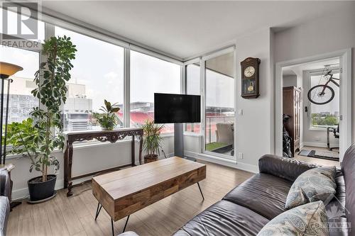 1035 Bank Street Unit#705, Ottawa, ON - Indoor Photo Showing Living Room With Fireplace