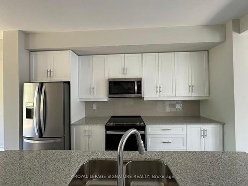 13 Folcroft St, Brampton, ON - Indoor Photo Showing Kitchen With Stainless Steel Kitchen With Double Sink