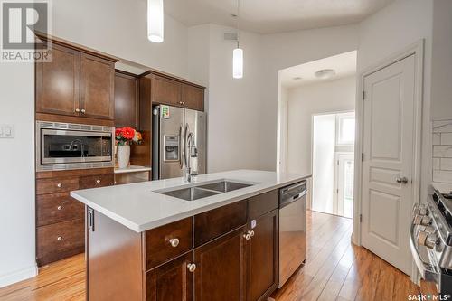 5369 Aerial Crescent, Regina, SK - Indoor Photo Showing Kitchen With Double Sink