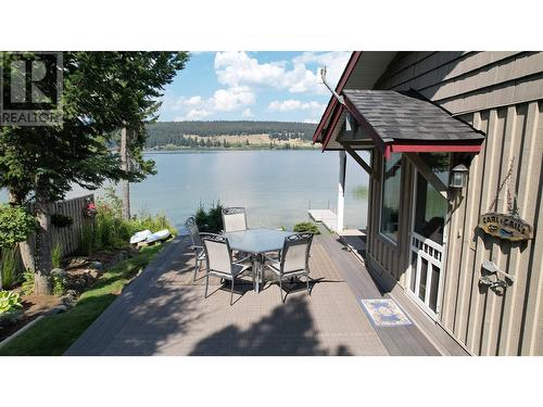 6329 Mulligan Drive, 100 Mile House, BC - Outdoor With Body Of Water With Deck Patio Veranda