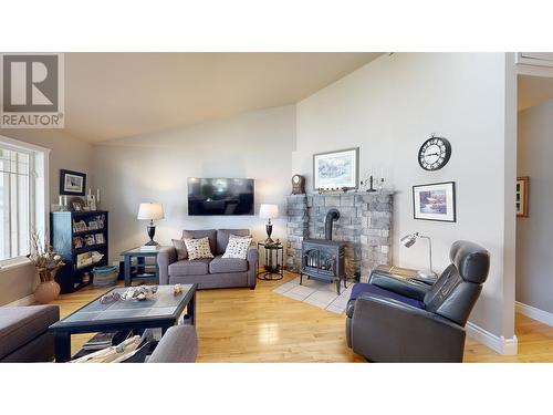 6329 Mulligan Drive, 100 Mile House, BC - Indoor Photo Showing Living Room With Fireplace