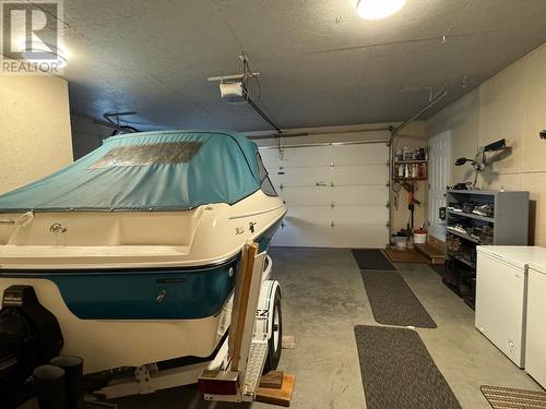 6329 Mulligan Drive, 100 Mile House, BC - Indoor Photo Showing Garage