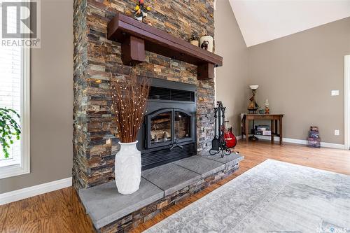 319 Tatanka Drive, Buffalo Pound Lake, SK - Indoor Photo Showing Living Room With Fireplace