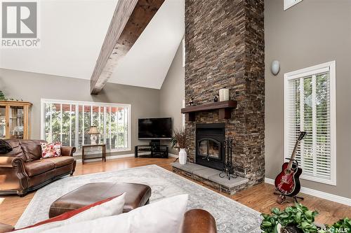 319 Tatanka Drive, Buffalo Pound Lake, SK - Indoor Photo Showing Living Room With Fireplace