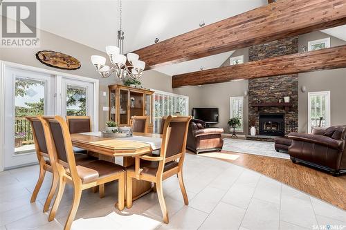 319 Tatanka Drive, Buffalo Pound Lake, SK - Indoor Photo Showing Dining Room With Fireplace