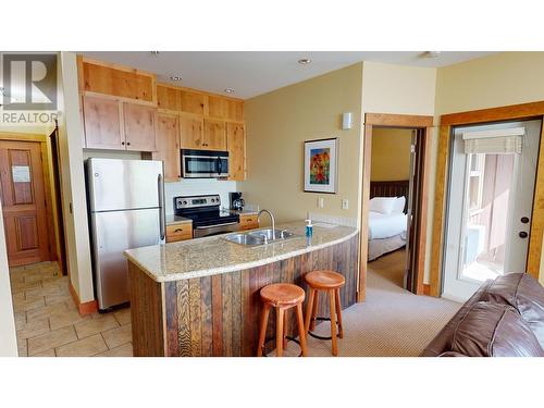 4559 Timberline Crescent Unit# 631C, Fernie, BC - Indoor Photo Showing Kitchen With Double Sink