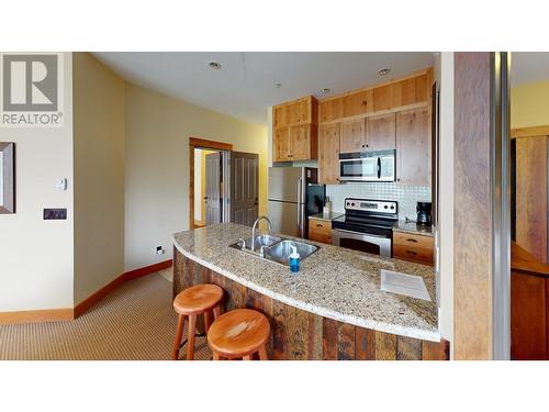 4559 Timberline Crescent Unit# 631C, Fernie, BC - Indoor Photo Showing Kitchen With Double Sink