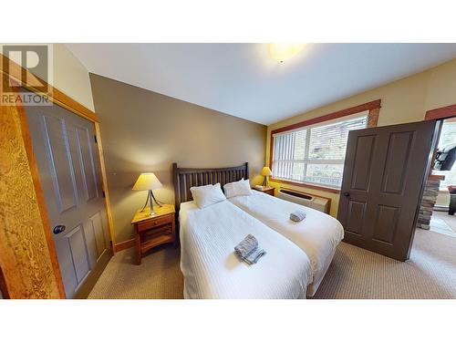 4559 Timberline Crescent Unit# 631C, Fernie, BC - Indoor Photo Showing Bedroom