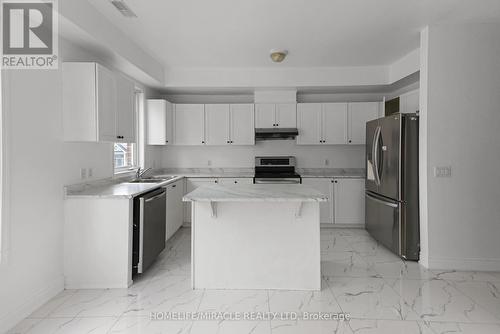 35 Harpreet Circle, Toronto (West Humber-Clairville), ON - Indoor Photo Showing Kitchen With Double Sink