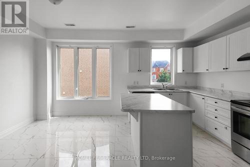 35 Harpreet Circle, Toronto (West Humber-Clairville), ON - Indoor Photo Showing Kitchen With Double Sink