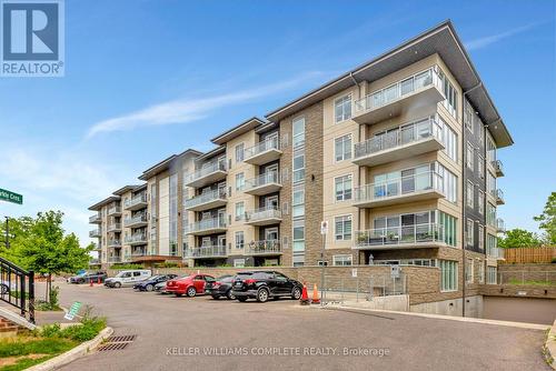 212 - 16 Markle Crescent, Hamilton (Ancaster), ON - Outdoor With Balcony With Facade