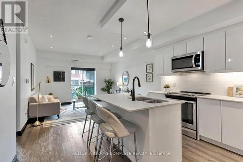 212 - 16 Markle Crescent, Hamilton (Ancaster), ON - Indoor Photo Showing Kitchen With Stainless Steel Kitchen With Double Sink With Upgraded Kitchen