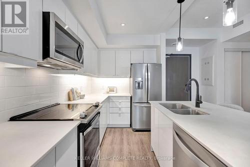 212 - 16 Markle Crescent, Hamilton (Ancaster), ON - Indoor Photo Showing Kitchen With Stainless Steel Kitchen With Double Sink With Upgraded Kitchen