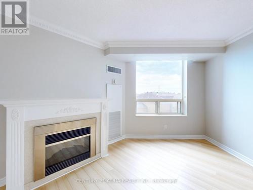 601 - 1883 Mcnicoll Avenue, Toronto (Steeles), ON - Indoor With Fireplace