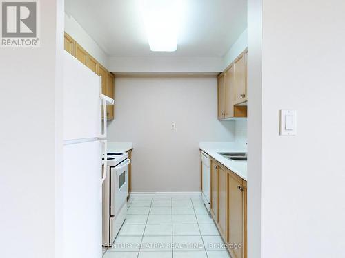 601 - 1883 Mcnicoll Avenue, Toronto (Steeles), ON - Indoor Photo Showing Kitchen With Double Sink