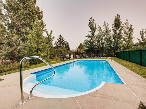 Pool - 408-25 Av. Ernest-Rochette, La Prairie, QC - Outdoor With In Ground Pool With Backyard