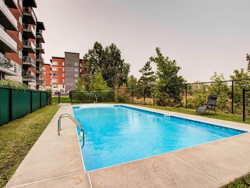 Pool - 408-25 Av. Ernest-Rochette, La Prairie, QC - Outdoor With In Ground Pool With Backyard