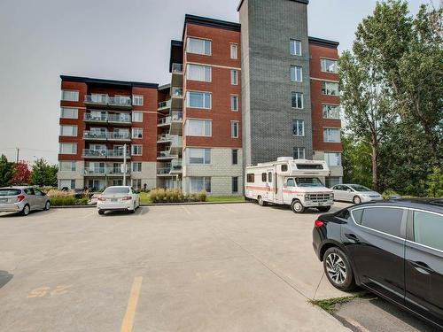 Parking - 408-25 Av. Ernest-Rochette, La Prairie, QC - Outdoor With Facade