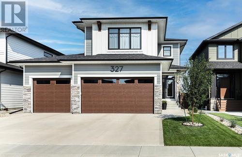 327 Aniskotaw Bend, Saskatoon, SK - Outdoor With Facade