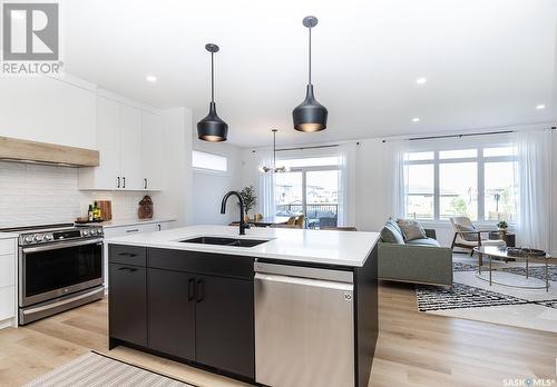 327 Aniskotaw Bend, Saskatoon, SK - Indoor Photo Showing Kitchen With Double Sink With Upgraded Kitchen