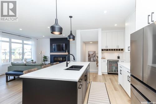 327 Aniskotaw Bend, Saskatoon, SK - Indoor Photo Showing Kitchen With Double Sink With Upgraded Kitchen