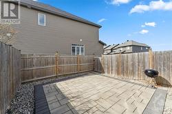 Fenced yard with interlock patio - 