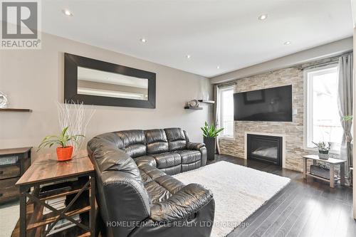 23 Killington Avenue, Vaughan (Kleinburg), ON - Indoor Photo Showing Living Room With Fireplace