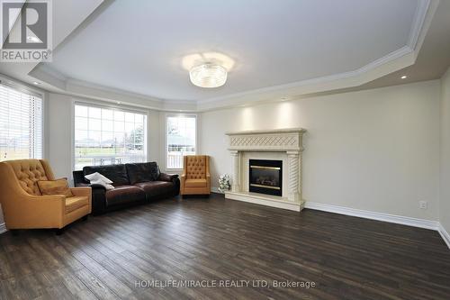 8 Nelly Court, Brampton (Vales Of Castlemore), ON - Indoor Photo Showing Living Room With Fireplace