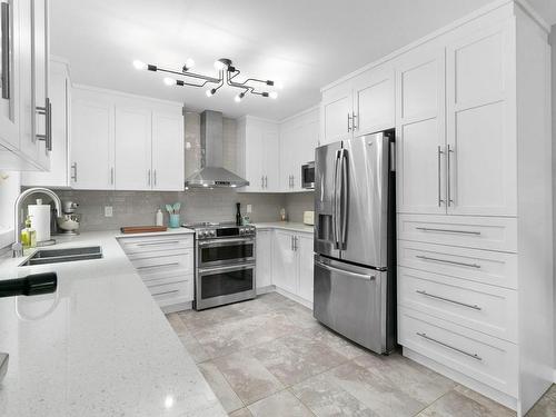 Kitchen - 401 Rue Du Clos-Du-Marquis, Prévost, QC - Indoor Photo Showing Kitchen With Double Sink