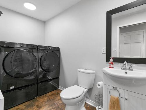 Salle de bains - 401 Rue Du Clos-Du-Marquis, Prévost, QC - Indoor Photo Showing Laundry Room