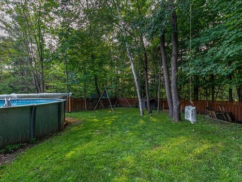 Backyard - 401 Rue Du Clos-Du-Marquis, Prévost, QC - Outdoor With Above Ground Pool