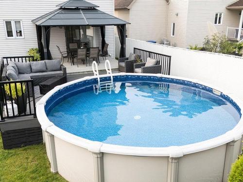 Cour - 343 Rue François-Cotineau, Terrebonne (Lachenaie), QC - Outdoor With Above Ground Pool With Exterior