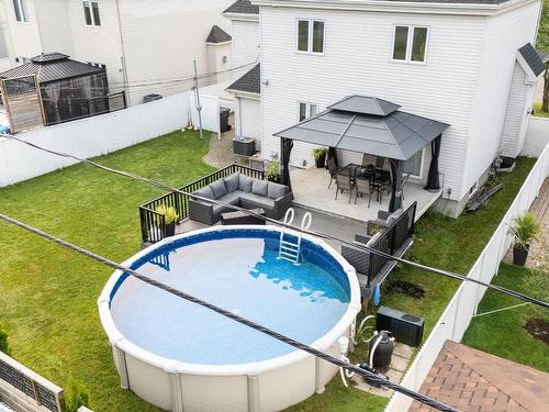 343 Rue François-Cotineau, Terrebonne (Lachenaie), QC - Outdoor With Above Ground Pool With Exterior