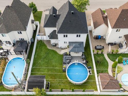 Aerial photo - 343 Rue François-Cotineau, Terrebonne (Lachenaie), QC - Outdoor With Above Ground Pool