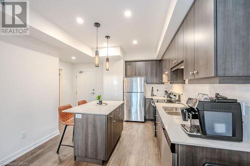 251 Northfield Drive Unit# 418, Waterloo, ON - Indoor Photo Showing Kitchen With Double Sink With Upgraded Kitchen