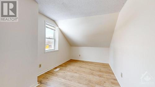 More new easy care flooring in upper Bedroom - 21 Elgin Street E, Arnprior, ON - Indoor Photo Showing Other Room