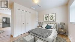 Unit B Bedroom is cozy & convenient with generous closet space. - 