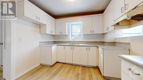 Clean white kitchen - all easy wipe surfaces & the appliances being delivered - 21 Elgin Street E, Arnprior, ON - Indoor Photo Showing Kitchen