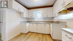 Clean white kitchen - all easy wipe surfaces & the appliances being delivered - 