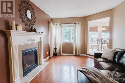 8 Stonemeadow Drive, Ottawa, ON - Indoor Photo Showing Living Room With Fireplace