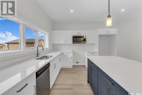 119 Taube Avenue, Saskatoon, SK - Indoor Photo Showing Kitchen With Double Sink