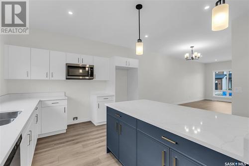 119 Taube Avenue, Saskatoon, SK - Indoor Photo Showing Kitchen With Double Sink