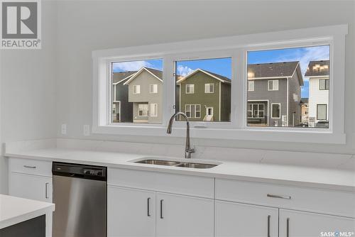 119 Taube Avenue, Saskatoon, SK - Indoor Photo Showing Kitchen With Double Sink