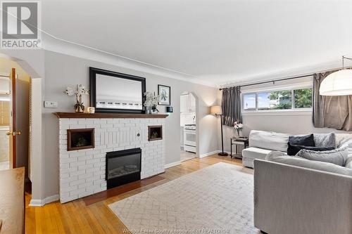 1292 Shoreline, Lakeshore, ON - Indoor Photo Showing Living Room With Fireplace